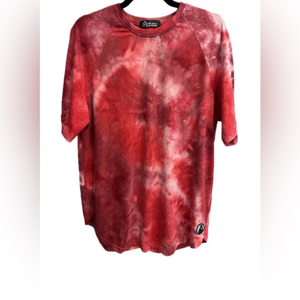 Dak Prescott Owned Gentlemen’s Playbook Tee.
Red Tie-Dye- Fits like Mens XL